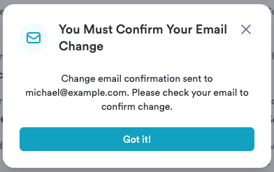 Confirmation message explaining that the email change must be verified from the new inbox.